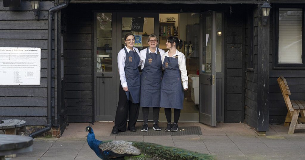 A great team at The Grain Shed cafe, including George the peacock.