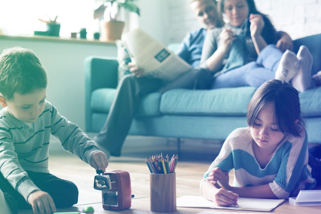 Children playing and parents watching image for Wills and estate planning for Blended Families blog