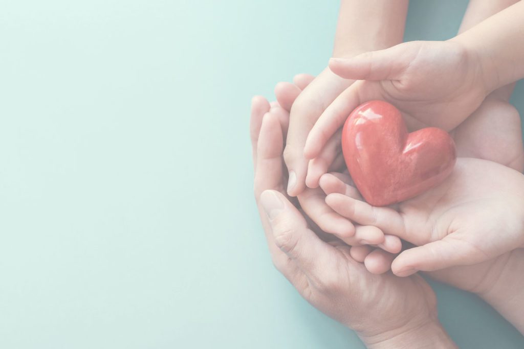 Hands holding a heart image for understanding probate: a guide for executors of an estate blog